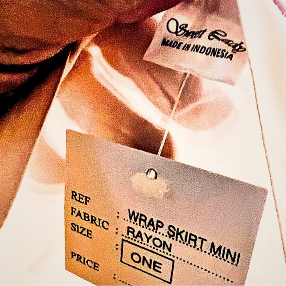One size fits all wrap around rayon skirt. Can be used as a shawl too.